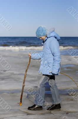 Girl walking at Baltic-Sea