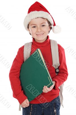 child studying with Santa Claus hat