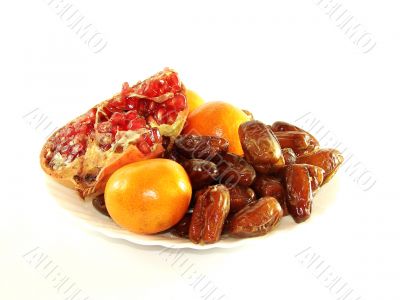 pomegranate. tangerines. dates