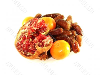 Pomegranate. Tangerines. Dates