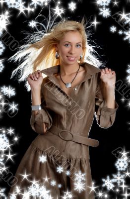 dancing blond in brown dress with snowflakes