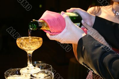pouring champagne