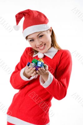 cute santa with tiny gifts smiling
