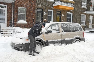 Man shovelling and removing snow