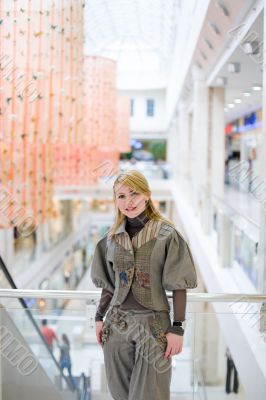Pretty girl posing in a mall