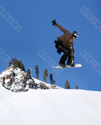 Snowboarder jumping