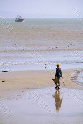 The cleaner on the beach