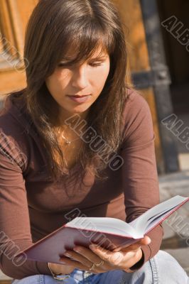 Girl student reading