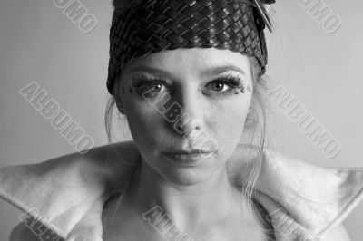 Fashion portrait of a blond girl in black and white