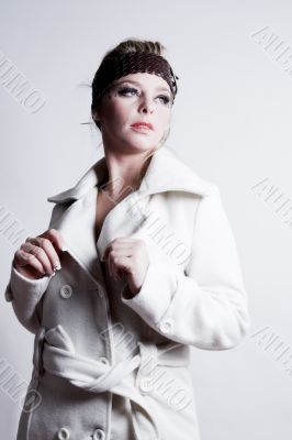 Fashion portrait of a warm robe