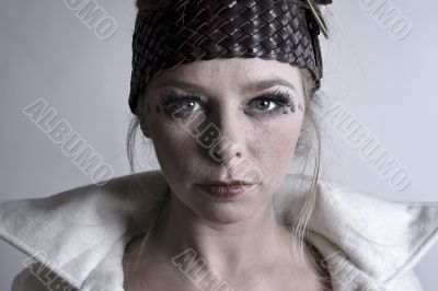Fashion portrait of a blond girl with robe