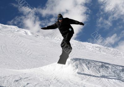 Snowboarder jumping