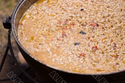 Cooking pilaf on fire