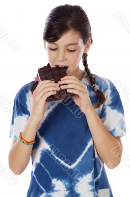 adorable girl eating chocolate