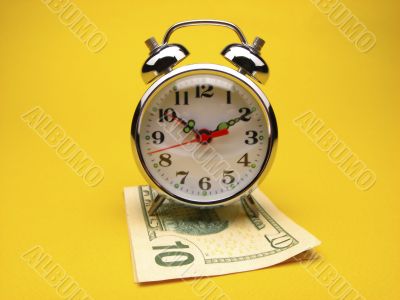 alarm clock and money