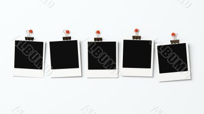 Five polaroid blanks on a wall 3D