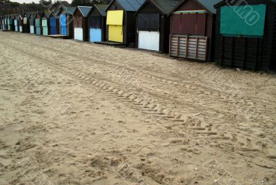 Beach with huts in winter