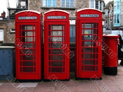 Three telephone boxes and post box