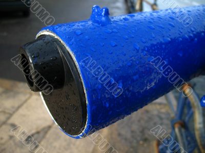 Close up of rain spattered telescope