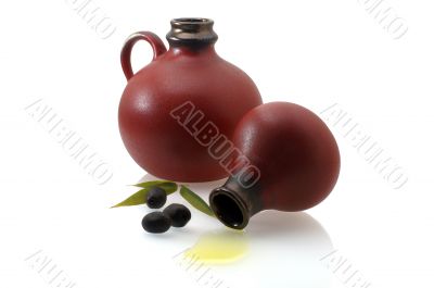two old jugs with olive oil