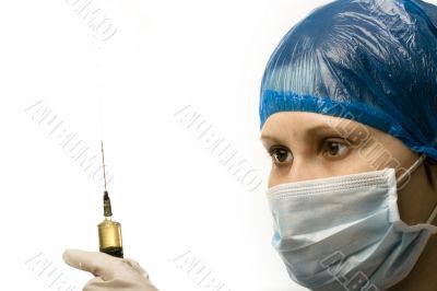 Woman doctor with syringe