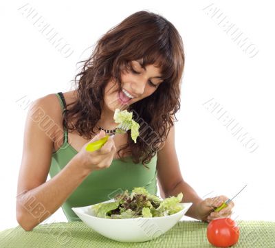 teenager eating salad