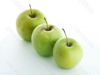 Three green apples