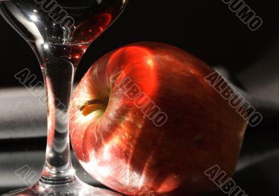 Red wine and red apple