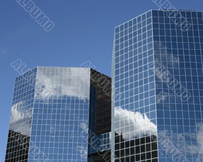 Mirrored Skyscrapers Joined by Bridge
