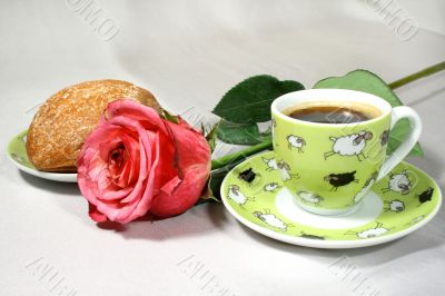 cup of coffe and rose