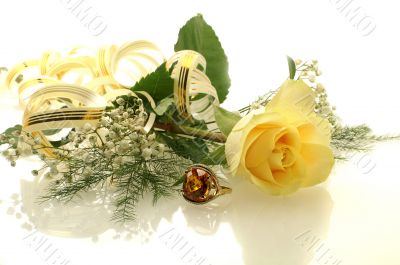 yellow rose with a ring