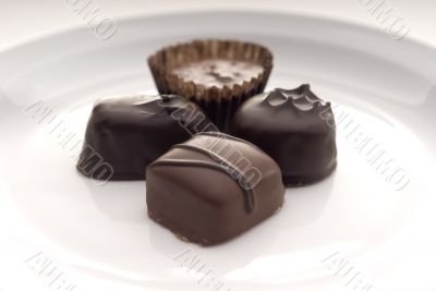 Close up of chocolates on a white plate