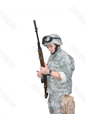 Soldier reloading his rifle