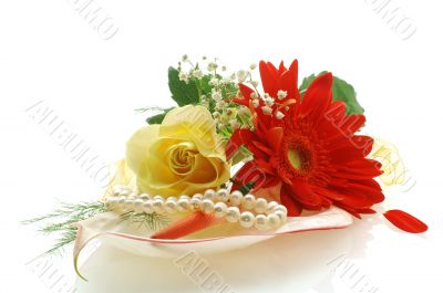 collection of flowers with a perls