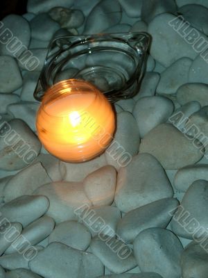 Candle and ashtray in a bar