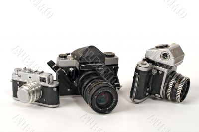 Three photo cameras