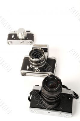 Three photo cameras