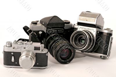 Three photo cameras