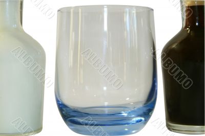 Two small decanters whith milk and coffee