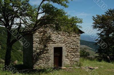 Mountain cabin made of stones