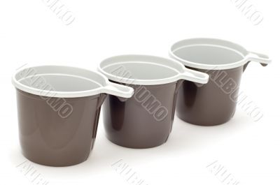 brown cup on white
