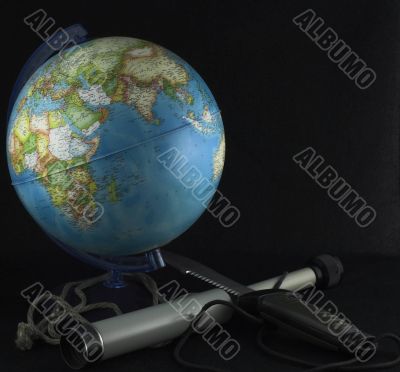globe and a spyglass