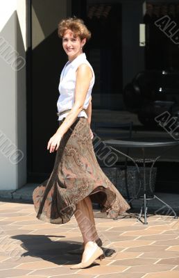Happy woman in a city