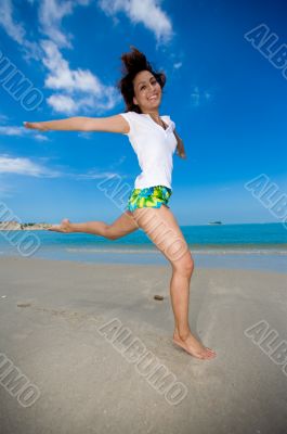 happy jump at the beach