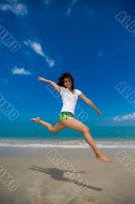 happy jump at the beach