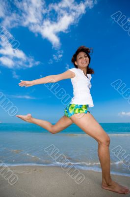happy jump at the beach