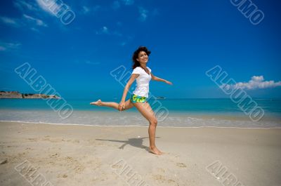happy jump at the beach