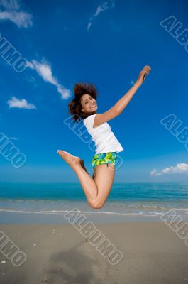 happy jump at the beach
