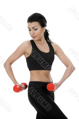 beautiful girl with dumbbells