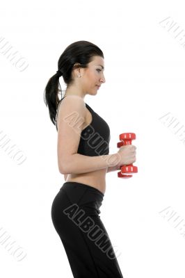 beautiful girl with dumbbells